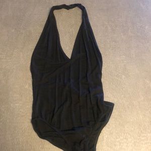 Low cut/low back black body suit